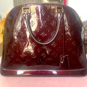 Largest alma size plum, designer tag